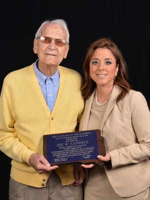 Attorney Joe Cadwell was honored Friday for his 75 years as a member of the State Bar of South Dakota. Helping honor him was his granddaughter Jennifer Van Anne, also an attorney.