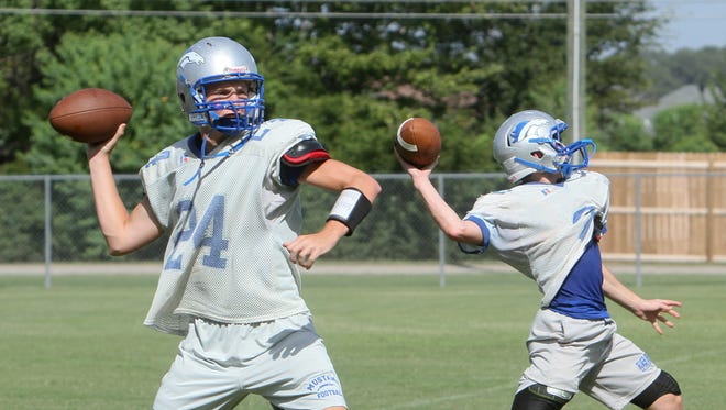 The River Oaks High School football team hits the practice field on Wednesday, Aug. 20, 2014.