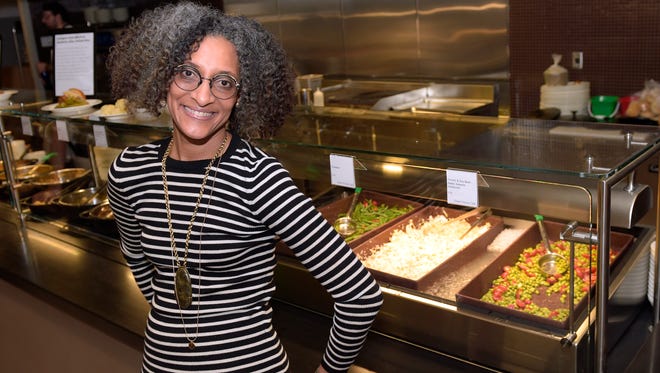 Carla Hall, the Chew co-host and Top Chef alum, poses for a photo inside the North Star Cafe at the National Museum of African American History and Culture in Washington.