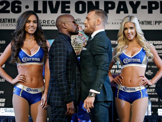 Floyd Mayweather Jr. and Conor McGregor face off during