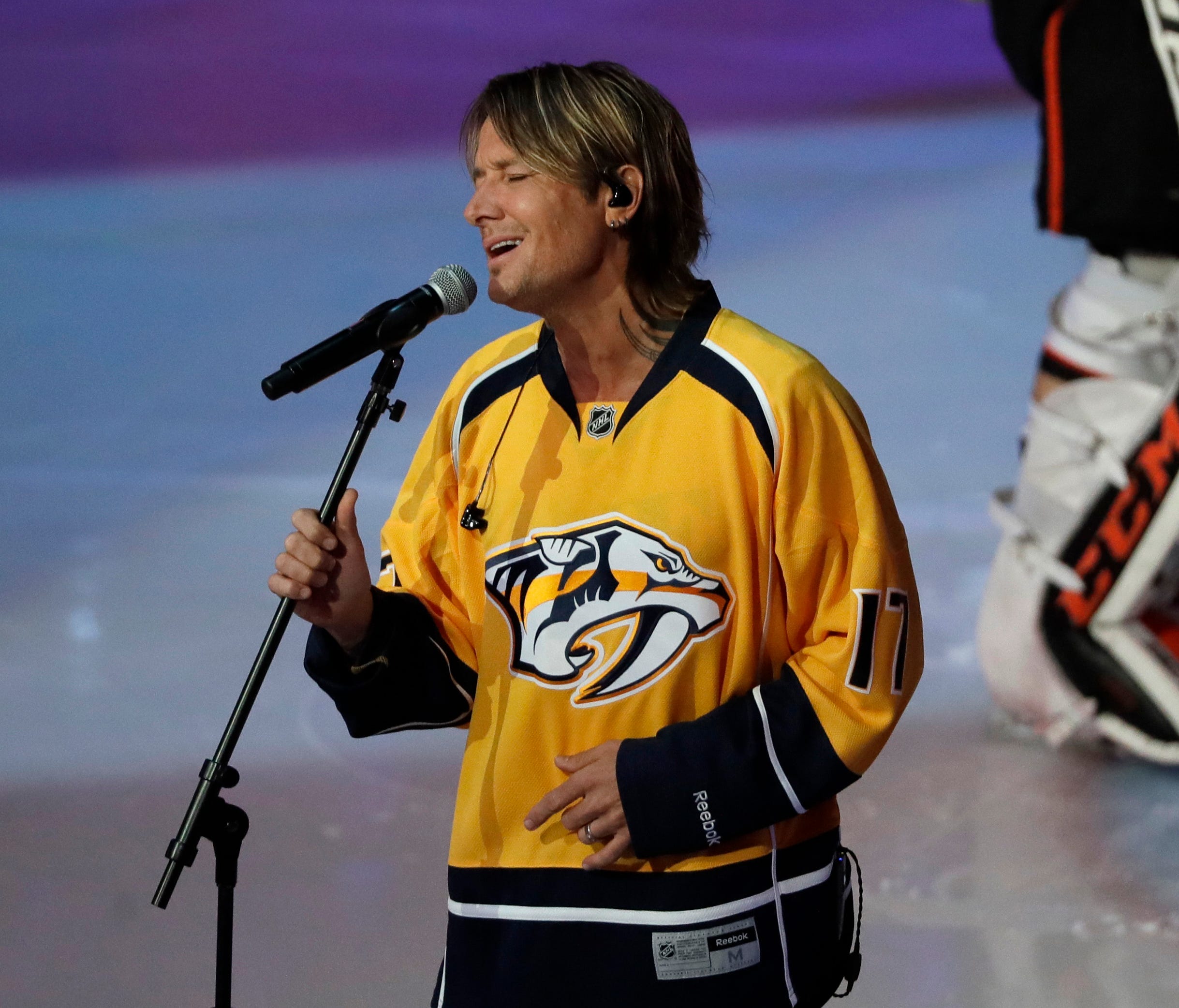 Country Music recording artist Keith Urban sings the national anthem before Game 3 of the Western Conference final series between the Nashville Predators and the Anaheim Ducks.