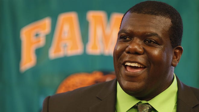 FAMU Athletic Director Milton Overton Jr. speaks to the 220 Quarterback Club about his hopes for the future of Rattler athletics at the New Times Country Buffet on Wednesday.