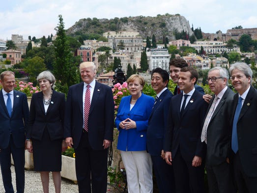 Trump joins G7 leaders for a photo at the Ancient Greek