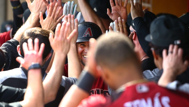Arizona Diamondbacks David Peralta smiles after hitting a 3-run home run against the Los Angeles Angels in the 3rd inning during spring training action on Mar. 6, 2018 at Salt River Fields at Talking Stick in Scottsdale, Ariz.