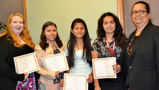 Bridgeton High School students Andrea Butcher, Nathaly Hernandez, Oriana Lopez Morales and Saray Hernandez Salazar, and Principal Lynne Williams, at the Soroptimist International Cumberland County dinner in September. The students were honored as Students of the Month.