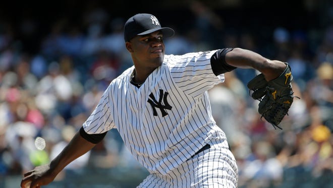 New York Yankees' Michael Pineda pitches during the first inning of a baseball game against the Texas Rangers Thursday, June 30, 2016, in New York.
