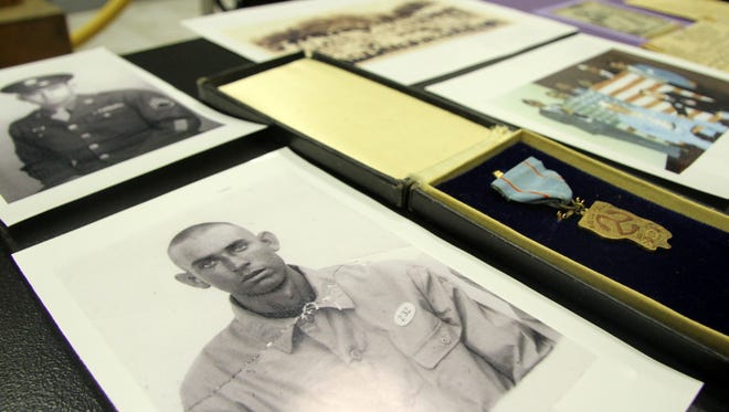 A photo of Marvin Bailey as a Japanese prisoner of war is among items on exhibit at the Carlsbad Museum & Art Center..