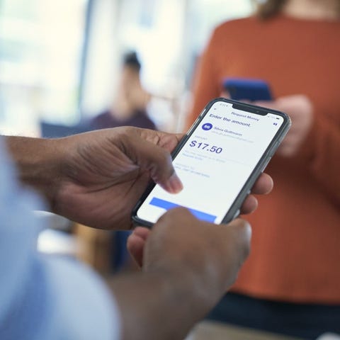 A person using a mobile U.S. Bank app on their sma
