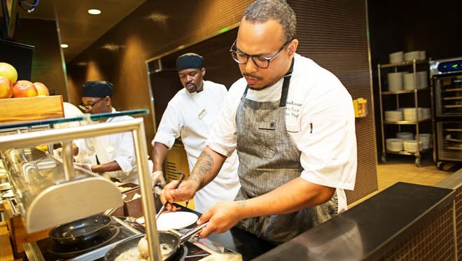 Executive Chef Jerome Grant leads the kitchen at Sweet Home Cafe inside the National Museum of African American History and Culture in Washington, DC