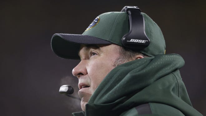 Green Bay Packers coach Mike McCarthy along the sidelines against the Minnesota Vikings at Lambeau Field.
