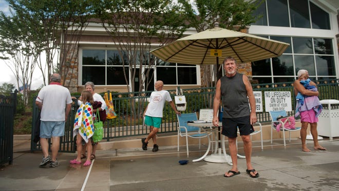 Swimmers at the pool in Sun City Carolina Lakes, a retirement community in Fort Mill, S.C. Michael Farkas, center right, and his wife Brenda moved to the community from New Jersey.