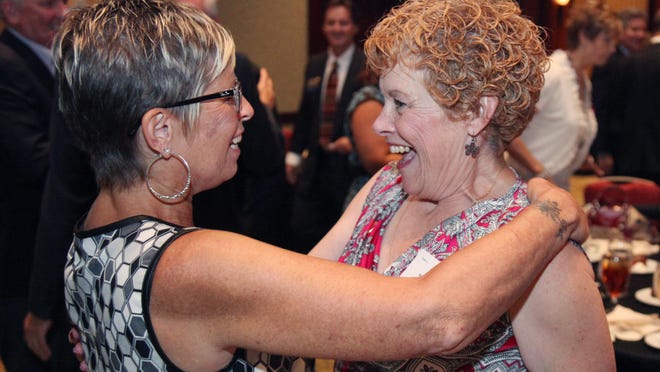 Janet Martin congratulates Barbara “Bobbi” Bird after being honored with the 2013 Bonita Springs Citizen of the Year award during the Bonita Springs Area Chamber of Commerce Awards Meeting and Luncheon at the Hyatt Regency on Wednesday. Photos by Jack Hardman/The News-Press Janet Martin congratulates Bobbi Bird after being honored with the 2013 Bonita Springs Citizen of the Year award during the Bonita Springs Area Chamber of Commerce Awards Meeting and Luncheon at the Hyatt Regency on Wednesday.