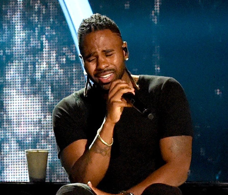 Luke Bryan (L) and Jason Derulo perform onstage during the 2017 CMT Music Awards - Rehearsals at Music City Convention Center on June 5, 2017, in Nashville, Tenn.