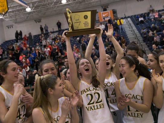 Pascack Valley’s Shannon Culloo holds her team’s championship