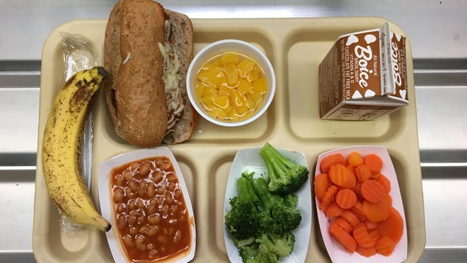 FILE - This Jan. 25, 2017 file photo shows a lunch served at J.F.K Elementary School in Kingston, N.Y., where all meals are now free under the federal Community Eligibility Provision. A donor inspired by a tweet raised money to pay off lunch debt in districts around the country, as well as thousands of dollars in overdue lunch fees at other schools in the Kingston district. (AP Photo/Mary Esch, FIle)