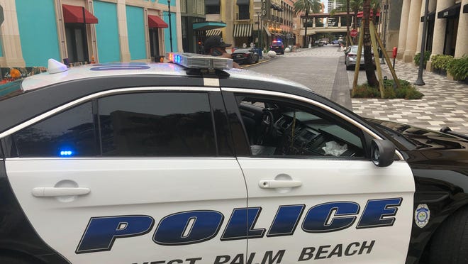 Police block off access to Rosemary Square in West Palm Beach on Monday, Aug. 5, 2019.