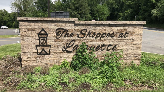 The entrance sign for the Shoppes at Lafayette Thursday, June 11. The shopping center is set to reopen Monday, the first day of Stage of Two of the state's road to recovery.