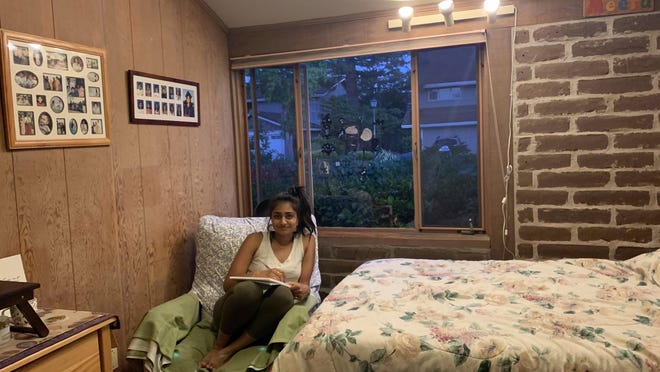 Meera Parat, a data scientist, is still conducting video calls from her childhood bedroom in Palo Alto, Calif., after leaving her apartment in Seattle due to the pandemic.