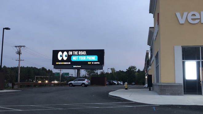 Jami Pandiscio's design on a Clear Channel billboard, at the Ledgeview Plaza off Rte. 1 in Wrentham.