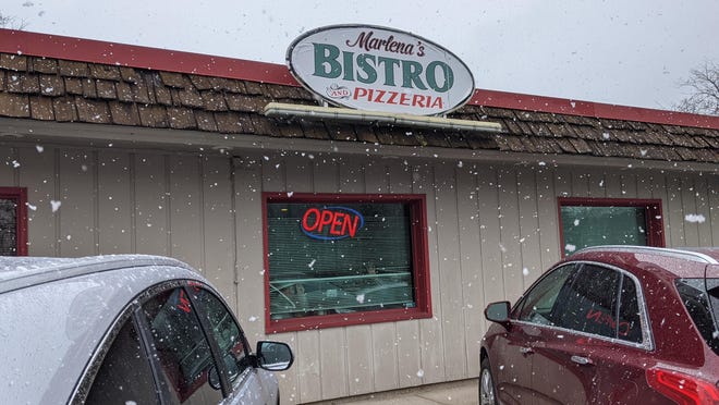 Marlena's Bistro and Pizzeria in Holland has remained open throughout the state-wide dine-in ban. A state agency suspended the restaurant's food establishment license Thursday.