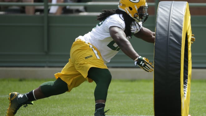 Eddie Lacy participates in a drill during a practice earlier this offseason.