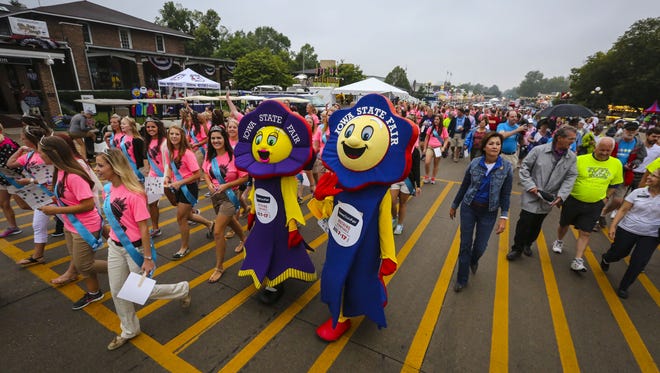 Spectators and State Fair Queen contestants at the 2014 Iowa State Fair.