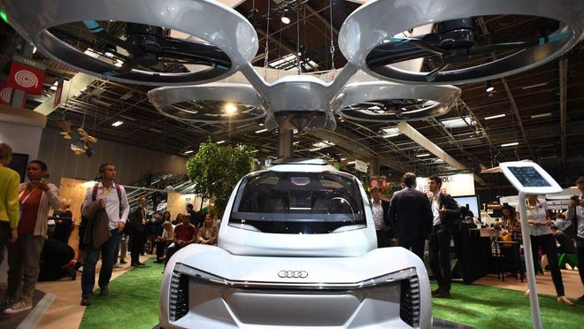 A flying car prototype, developed by Airbus and the German car manufacturer Audi, is pictured at the Airbus industrie exhibition stand during the Vivatech fair in this May 24, 2018, file photo. Malaysia says it is trying to develop its first flying car, but it won’t let the general public drive it. It will instead be developed for transport-service companies