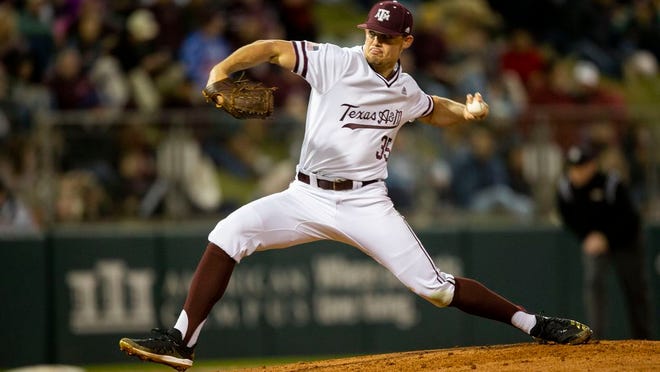 In this Feb. 14, 2020, file photo, Texas A&M's Asa Lacy (35) throws a strike against a Miami (Ohio) batter during an NCAA baseball game in College Station, Texas.