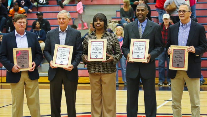 Oakland inducted its first basketball hall of fame class on Tuesday. From left, former boys coach Dickie Thomas, former girls coach Ben Cates, former girls standout Alice Lawrence, former boys standout Fred Batten Jr. and former boys coach Randy King were all inducted.