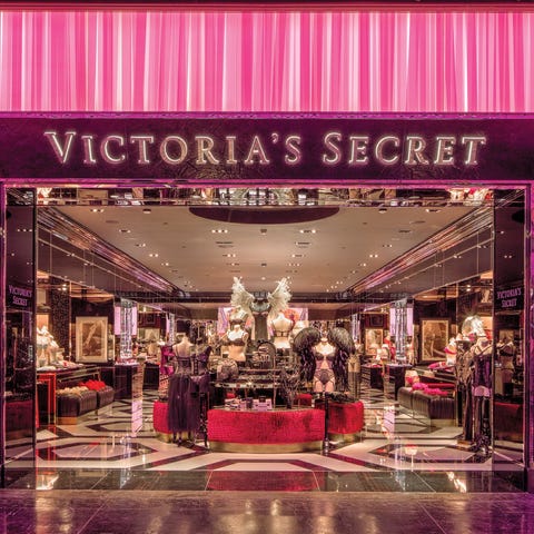 A brightly lit Victoria's Secret store front.