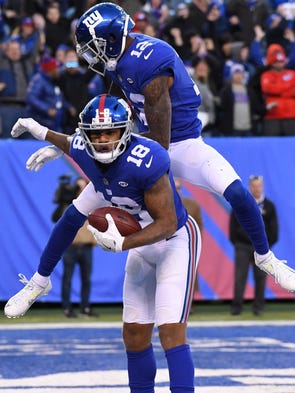 New York Giants wide receiver Roger Lewis celebrates