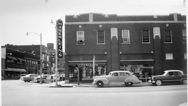 Then and Now. The building located at 101 S Main Street in El Dorado. In 1955, it was home to Haberlein's.
