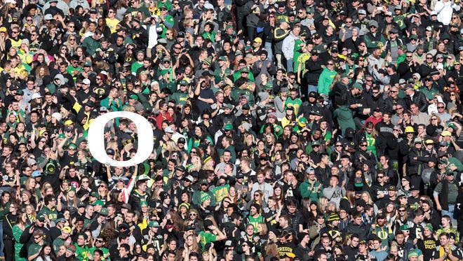 Nov 21, 2015; Eugene, OR, USA; Oregon Ducks fans hold a large sign in the crowd against the USC Trojans at Autzen Stadium. Mandatory Credit: Scott Olmos-USA TODAY Sports