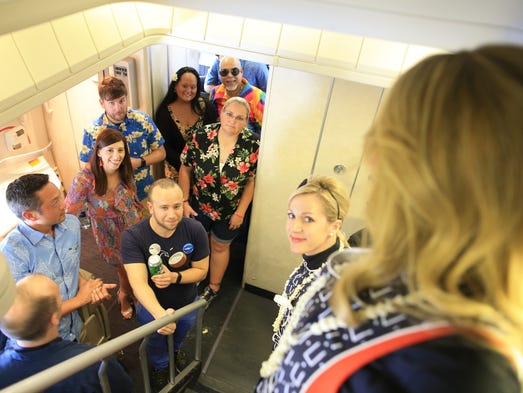 Passengers queue to take a peek at the upper deck of