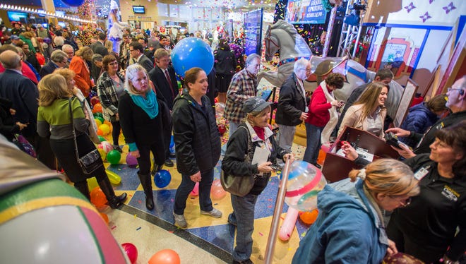 Visitors line up to enter the gaming floor moments after Tioga Downs officially opened the casino gaming floor and poker room for the first time on Friday, December 2, 2016.