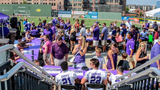 The Mast General Store Furman Football FanFest was held  Sunday at Fluor Field in downtown Greenville. The event offers Furman fans the opportunity to secure the official 2016 Furman poster and autographs.  August 28,2016