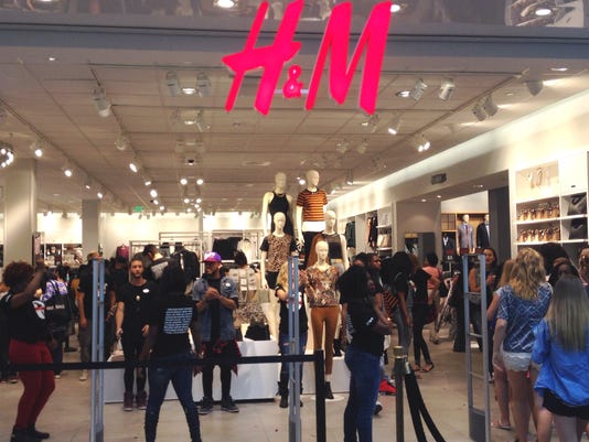 Hundreds line up for new store's official opening Thursday