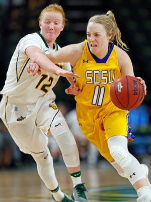 Sarah Jacobson South Dakota State's Madison Guebert drives against North Dakota State's Sarah Jacobson Wednesday at the Scheels Center at the Sanford Health Athletic Complex.