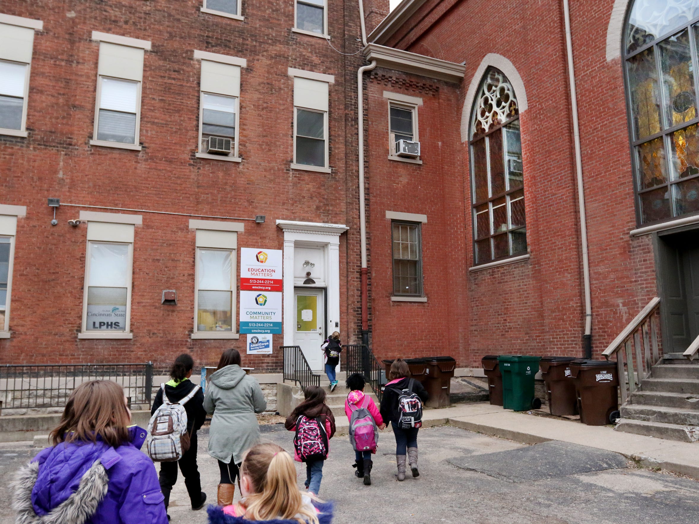 Girl Scouts, both Brownies and Cadets, make their way