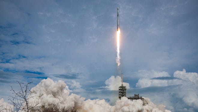 A SpaceX Falcon 9 rocket blasts off from Kennedy Space Center's pad 39A in June 2017 on a commercial resupply mission to the ISS. The booster from this mission will be reflown on Tuesday's launch.