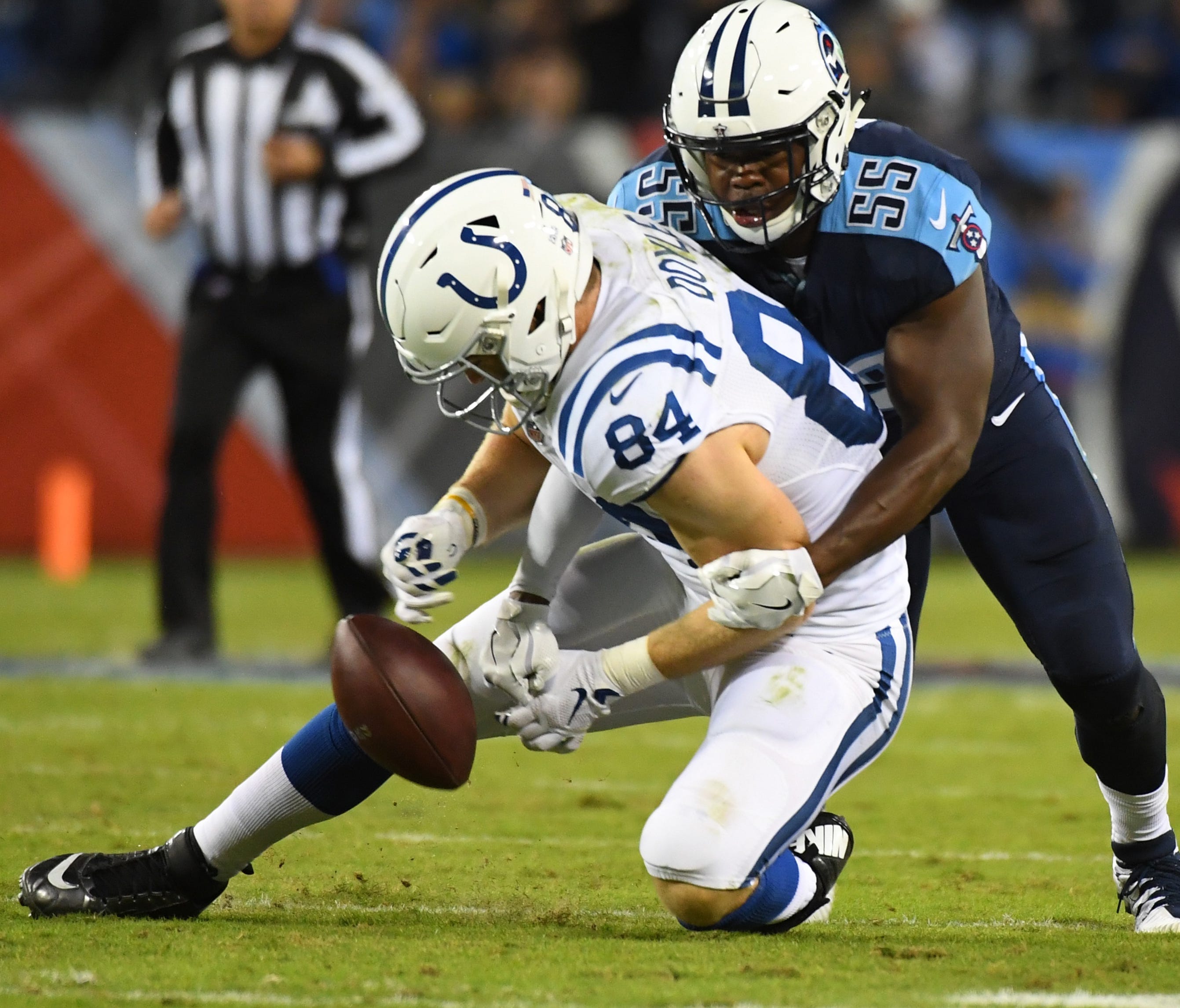 Oct 16, 2017; Nashville, TN, USA; Tennessee Titans linebacker Jayon Brown (55) breaks up a pass intended for Indianapolis Colts tight end Jack Doyle (84) during the second half at Nissan Stadium. Mandatory Credit: Christopher Hanewinckel-USA TODAY Sp