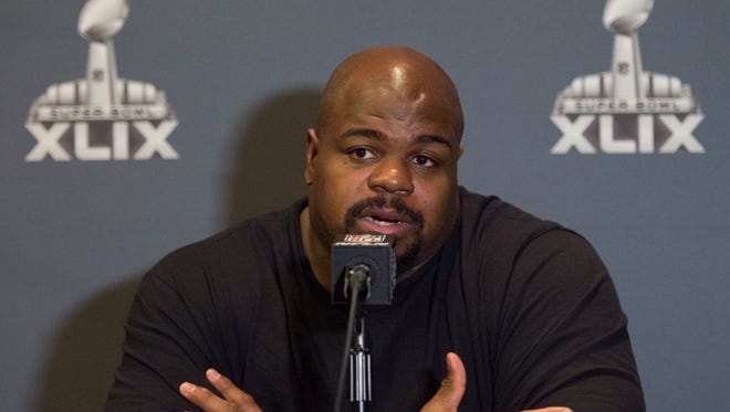 New England Patriots defensive tackle Vince Wilfork (75) addresses the media during a press conference after their arrival in preparation for Super Bowl XLIX at the Sheraton Wild Horse Pass Hotel in Chandler on Jan. 26.