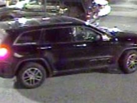 A Jeep Grand Cherokee, possibly 2011, is suspected