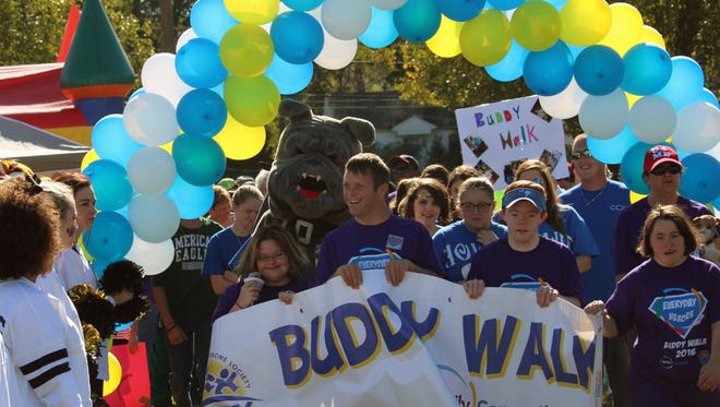 About 800 people took part in this year's Buddy Walk on Sunday at Anderson University's athletic campus. The event seeks to raise awareness and financial support for Down syndrome.