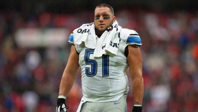 Detroit Lions center Dominic Raiola looks on during a game against the Atlanta Falcons at Wembley Stadium on Oct. 26, 2014 in London.