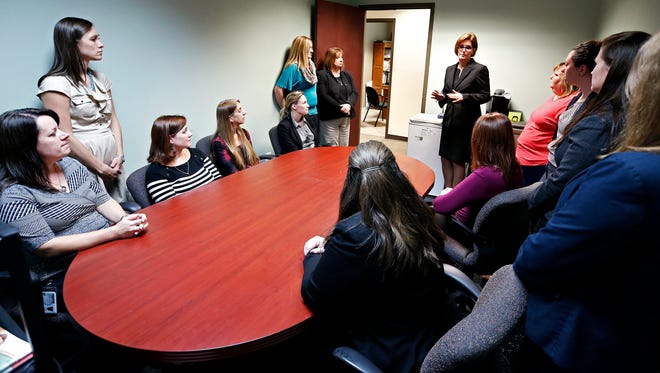 Christian County prosecutor Amy Fite leads an all-employee meeting of the prosecutor's office at the Christian County Justice Center in Ozark, Mo. on Oct. 21, 2015.