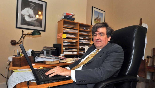 In this 2008 file photo, Oxford Lawyer Tom Freeland of Freeland & Freeland sits at his computer where he does his blogging from.