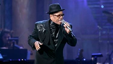 In this file photo, Bobby Womack performs after being inducted into the Rock and Roll Hall of Fame during the 2009 Rock and Roll Hall of Fame Induction Ceremony, in Cleveland. Womack, 70, a colorful and highly influential R&B singer-songwriter who impacted artists from the Rolling Stones to Damon Albarn, has died. Womack's publicist Sonya Kolowrat confirmed to The Associated Press on Friday, that the singer died but had no other details to provide.