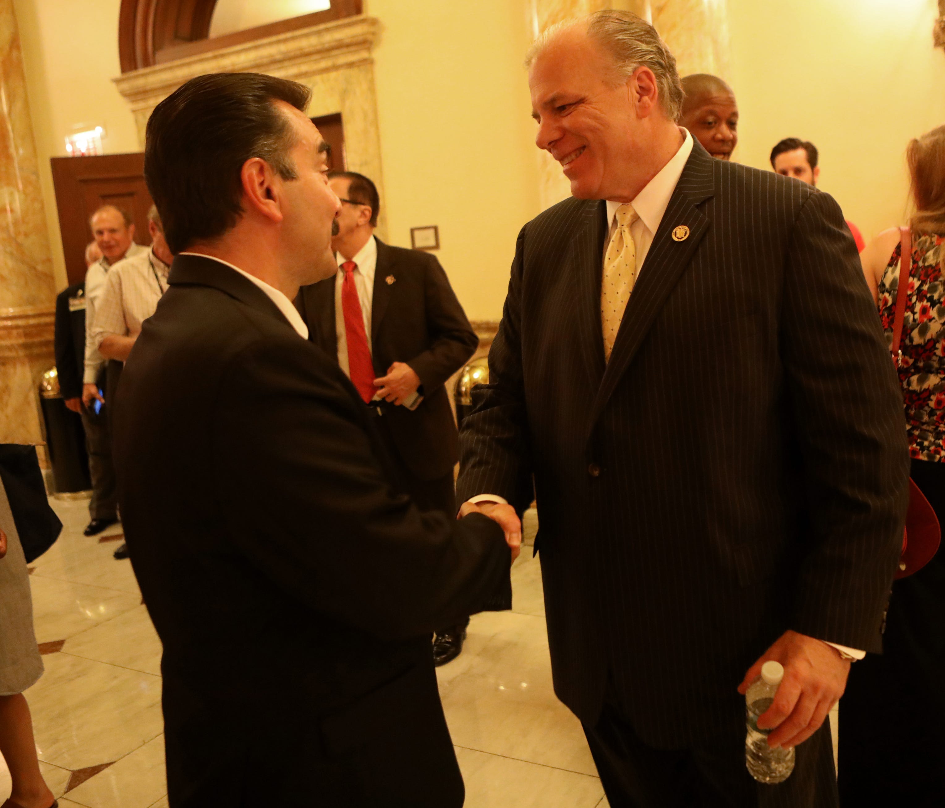 Senate President, Stephen Sweeney and Assembly President, Vincent Prieto shake hands after announcing a budget deal was reached. Monday July 3, 2017.