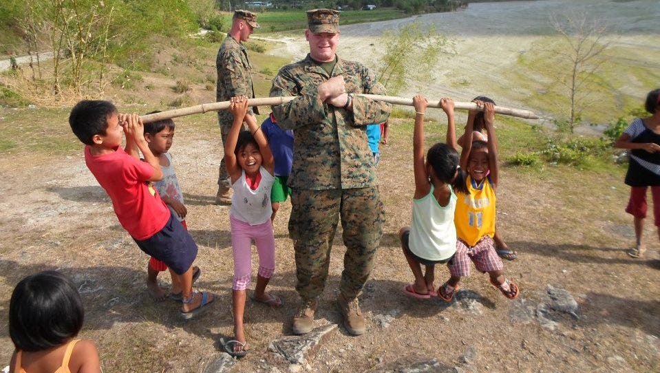 Military Members Find Challenge In College Football As Walk On Players